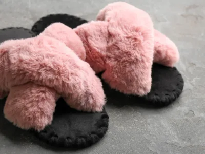 comfy slippers made from faux pink and black fur